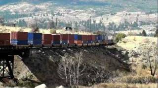 preview picture of video 'UPRR STACK TRAIN FOLLOWS AMTRAK TRAIN 5 ACROSS THE TRUCKEE'