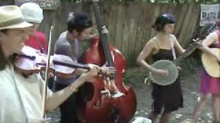 A string band playing at the Oregon Country Fair