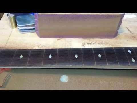 Bourbon - Wenge fretboard with 12" radius and gold diamond inlay.