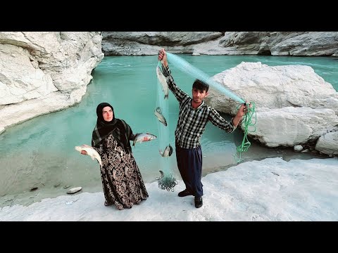 Fishing in the roaring river by a nomadic family: Babak and Narges...Iran 2023