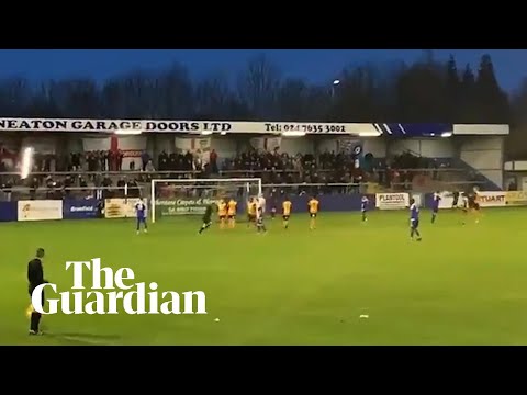 Nuneaton Borough keeper shanks penalty into stands and breaks a light