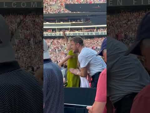 Dan Reynolds and his daughter Arrow at Taylor Swift concert