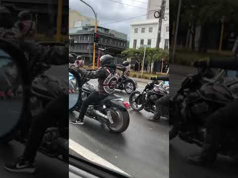 Police following a group of biker gang in New Zealand.
