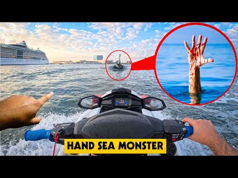 IF YOU SEE THE HAND SEA MONSTER WHILE DRIVING A JET SKI IN THE OCEAN, DO NOT APPROACH, DRIVE AWAY!