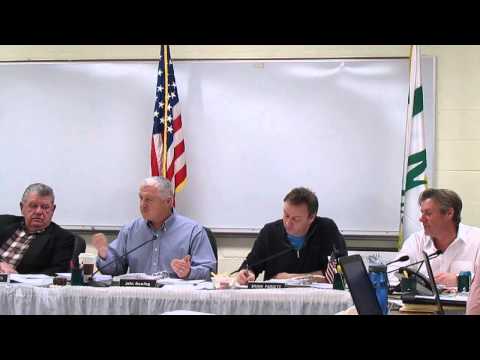 Grafton Selectman John Dowling referees between Dennis Flynn and Craig Dauphinais.