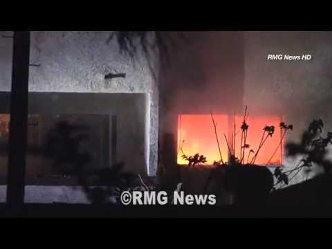 Barricaded man jumps from his burning apartment in Van Nuys, California.