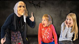 Amelia reads book stories for Avelina and Akim