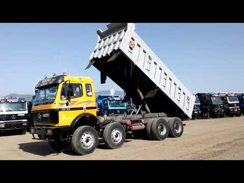 Mercedes 3535 Yellow in operation with tipping moves