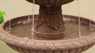 Watch A Video About the Noir Three Tier Faux Stone LED Outdoor Fountain