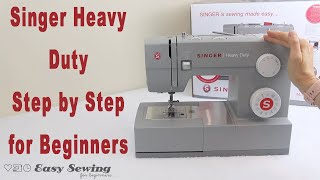 Hoe u een Singer Heavy Duty naaimachine bedient