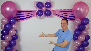 decoracion de cumpleaños - decoracion con globos - cortinas de papel crepe y columnas de globos