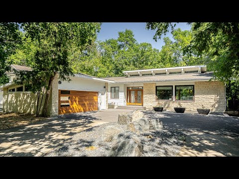 Prestigious 1.3 MILLION Dollar river front home in Winnipeg - Featuring Tesla Model X