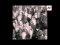CAN 068 PEOPLE PASS BACK TO EAST BERLIN AS WALL CLOSES