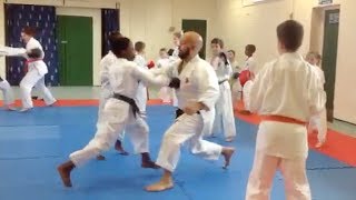 preview picture of video 'Mawashi geri block and counter (pad work drill)'
