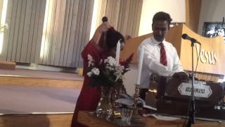 Pastor Latif and Razia Latif doind worship in Sweden