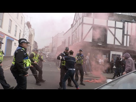 Batons out! Clashes in Cheltenham town centre as rival football teams clash before match