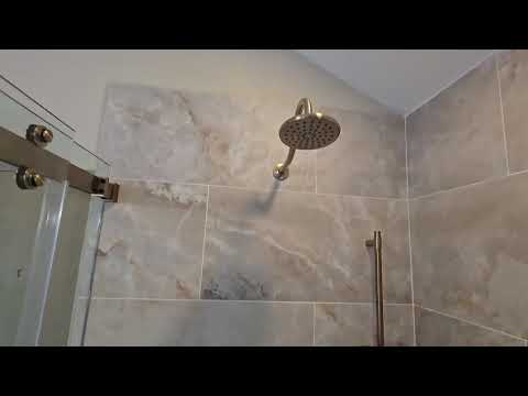 Bathroom Remodel in Suwanee, GA | Stainless Steel Tub & Glass Door System