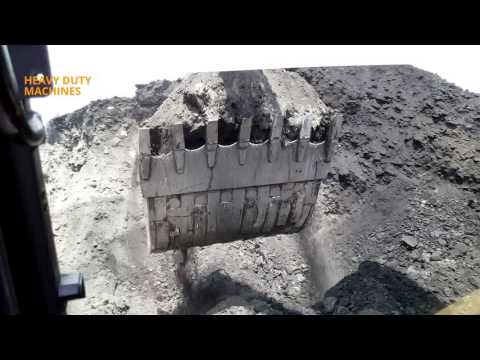 Komatsu pc800 lc with 11 cublic meters backet loading trucks with 2 pases!