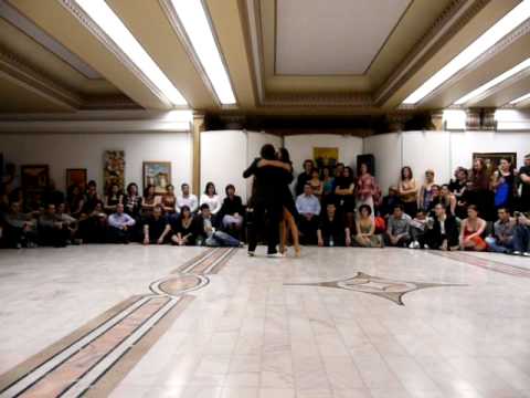  Adrian Veredice  and  Alejandra Hobert  are  dancing  to  a  tango  at  Bucharest Tango Encuentro Festival  in  2009