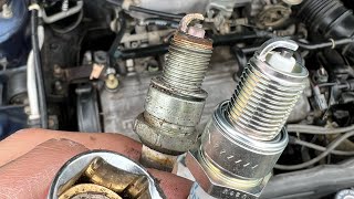 Spark plug replacement Mazda 323 1991