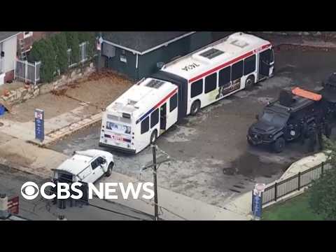 Suspected gunman barricades self on Philadelphia bus after killing 2 women, police say