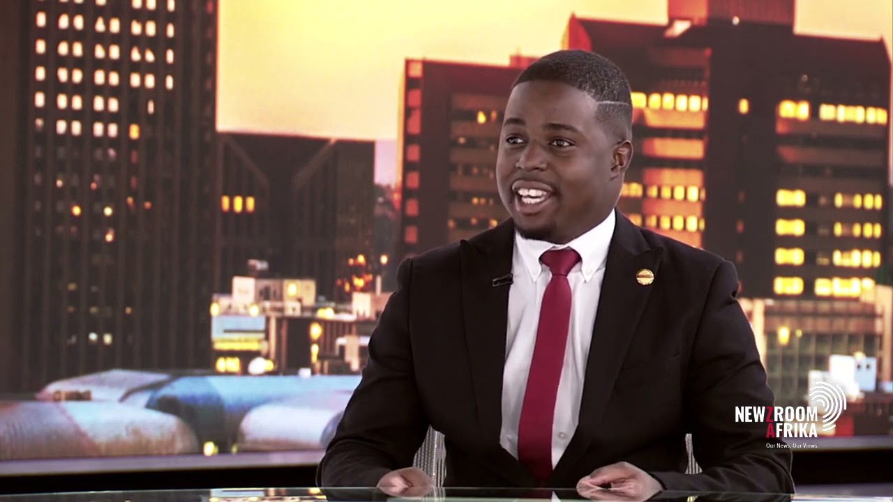 Andrew Tsuro seated in the Newzroom Afrika studio during his interview