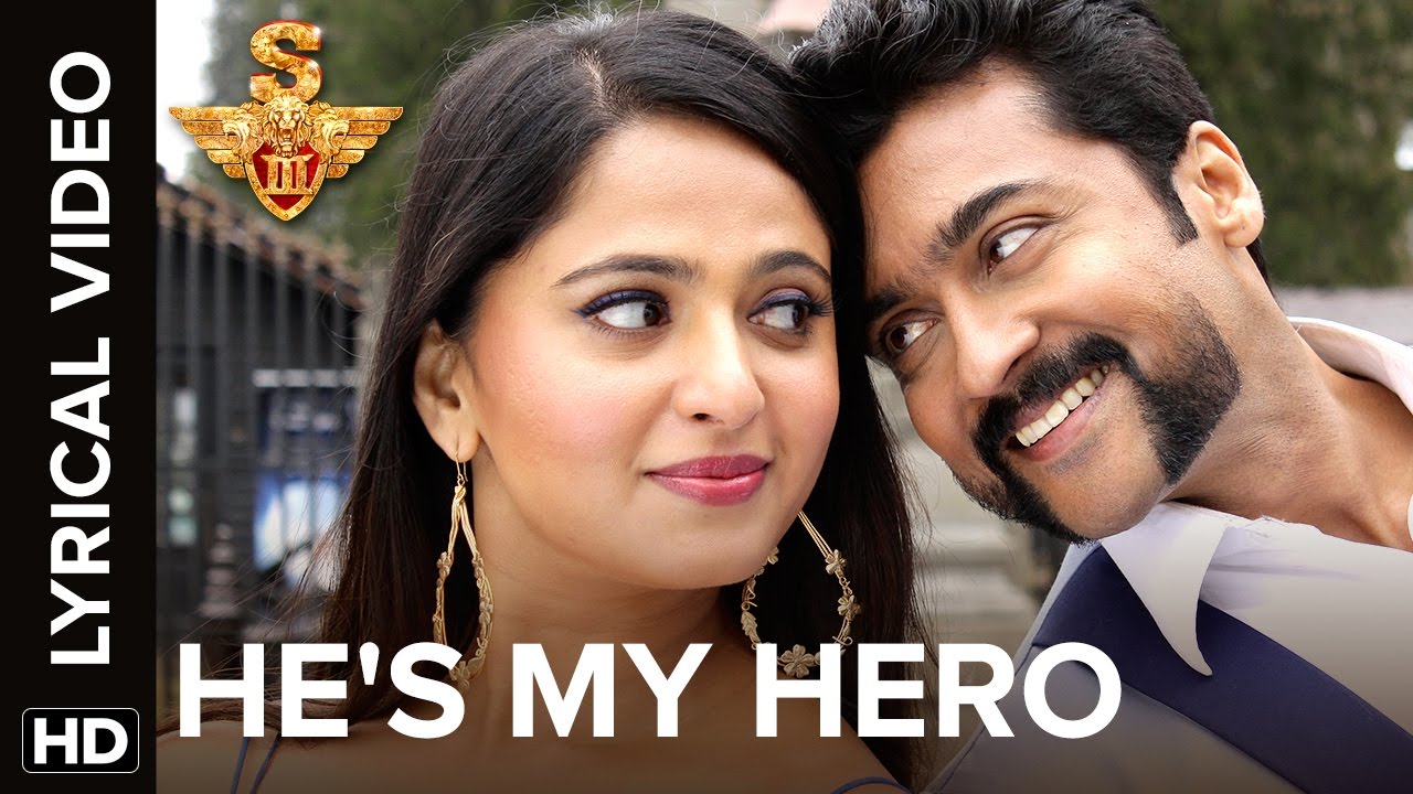He’s My Hero Lyrics | S3 (Singam 3) | Anushka Shetty, Shruti Haasan, Suriya | Malavika Manoj | Harris Jayaraj