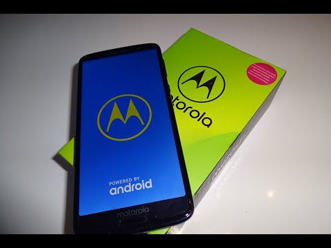 Insert the SIM or the memory card in your Motorola mobile phone g6