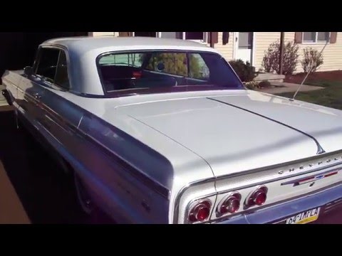Walker exhaust installed on a 64 Impala