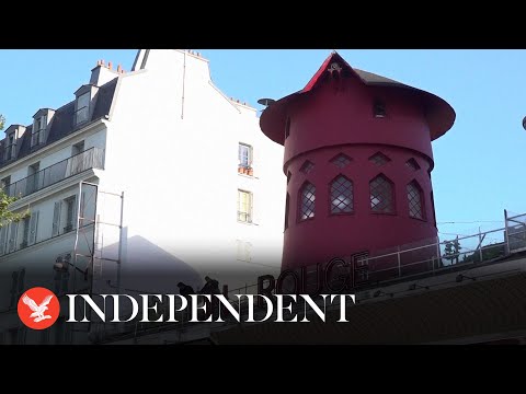 Moulin Rouge windmill blades lie in street after falling off overnight