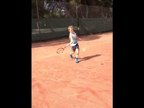 12 years old playing tennis