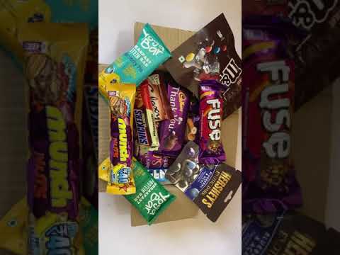 Box full of some lots of Cadbury chocolates and yoga bars