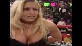 Mr McMahon forces Trish Stratus to strip