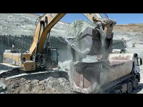 Caterpillar 390D Excavator Loading Mercedes Arocs Trucks - Pyramis Ate