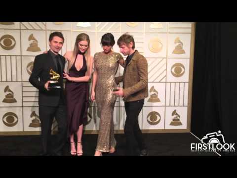 WINNER BEST ROCK ALBUM: Muse in the press room at the 58th GRAMMY Awards in Los Angeles