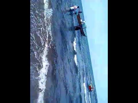 Rahim & sumaya. Play in the sea..