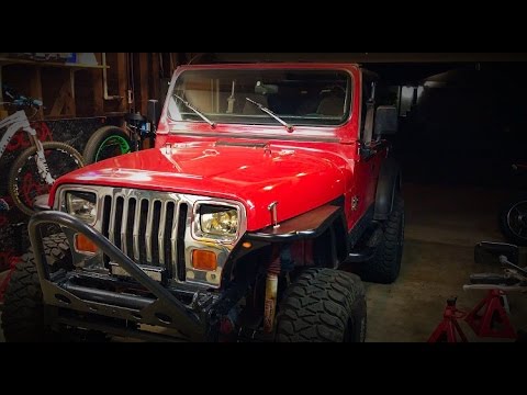 Nic's 1992 Wrangler YJ gets new springs and boomerang shackles!