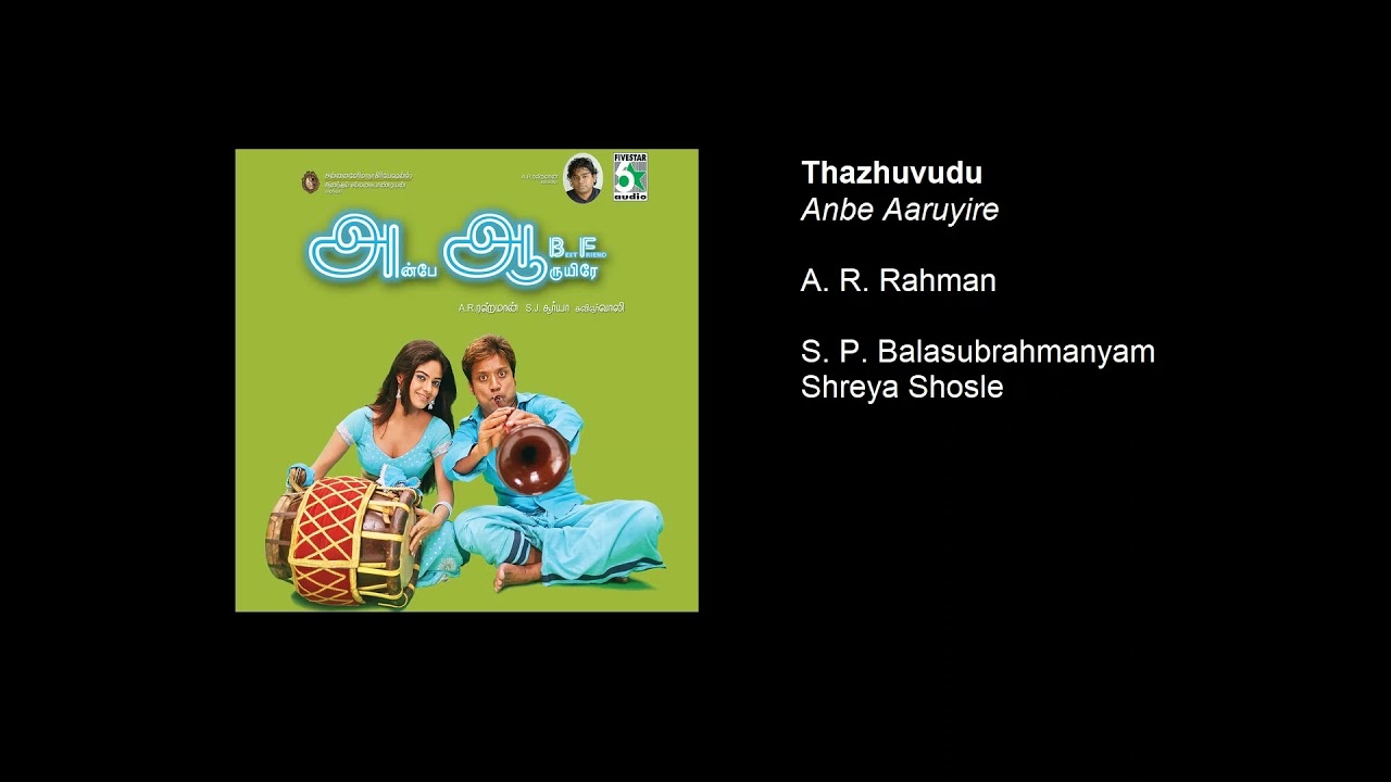 Thazhuvudu Song Lyrics | Anbe Aaruyire | S. P. Balasubrahmanyam, Shreya Ghoshal