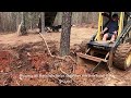How to use a stump bucket and push over a tree.