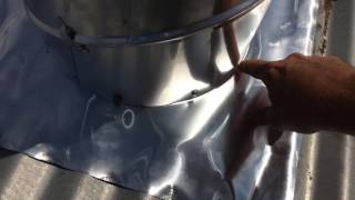 Edmonds Mill vent installed on an iron low pitch roof.m4v