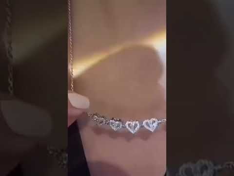 Silver steel four heart magnetic pendant