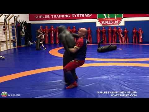 Coach Ivan Ivanov at age 50  challenges his young wrestlers with interval body lock throws