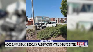 Good Samaritans rescue crash victim in Greensboro at Friendly Center
