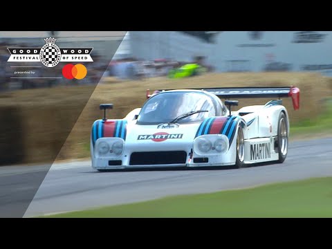 Awesome Lancia LC2 Group C monster attacks Goodwood Hill