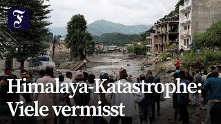 Hunderte Reisende nach Sturzflut vermisst