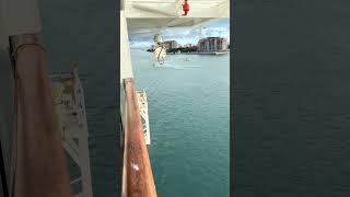 White Boat get caught by Police Boat for get out of away for Carnival Conquest Pass out of Miami