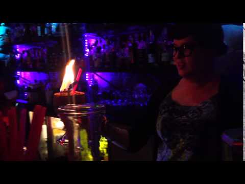 Sierra lighting a Tiki Cocktail on fire at Hale Pele Portland OR