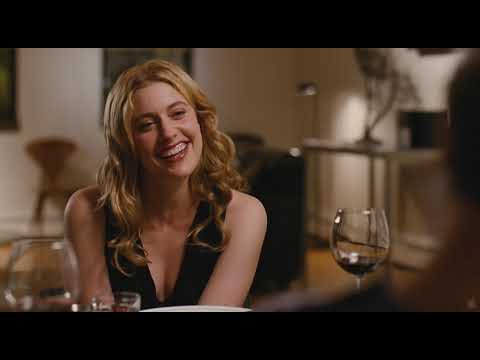 Lola Versus trailer frame: Greta Gerwig as Lola, walking through lower Manhattan with headphones on
