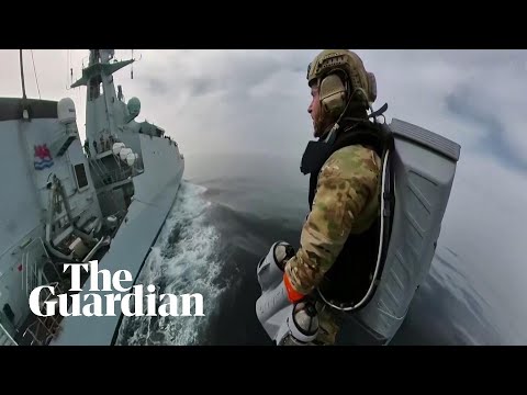 UK Royal Marines test flying jet suit between moving ships