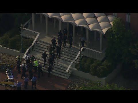 A shooting killed two people and wounded four at the University of North Carolina Charlotte campus on Tuesday. A suspect identified as 22-year-old Trystan Andrew Terrell is in custody. (May 1)